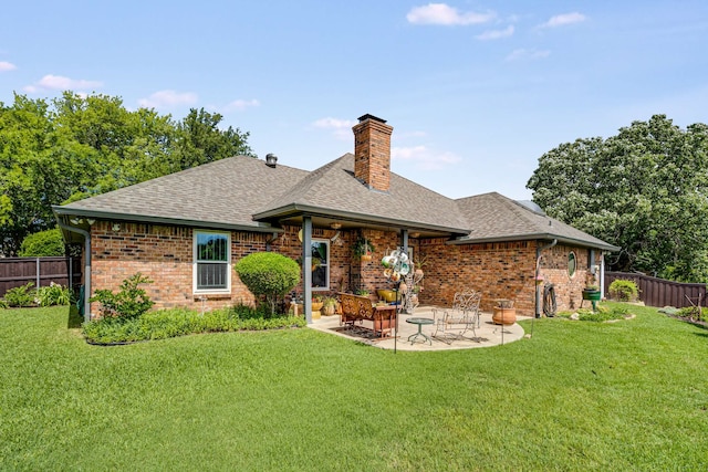 10253 Fieldcrest Dr, Benbrook, TX 76126 - rear view of house featuring a shingled roof, brick siding, a chimney, and a patio area