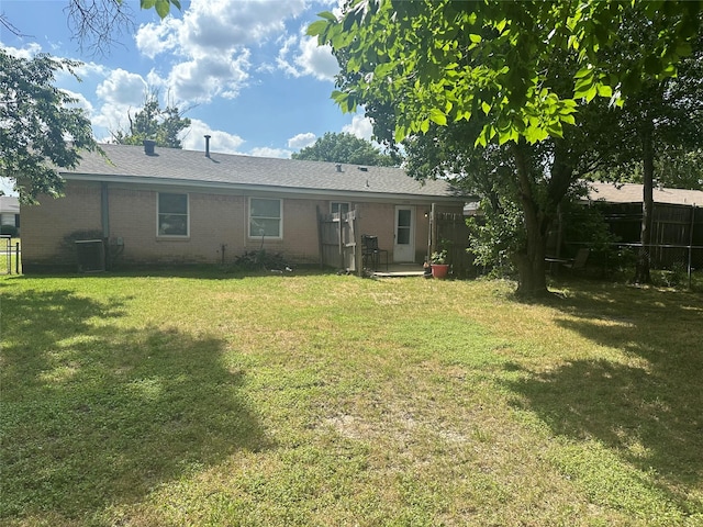 1330 Eastern Heights Dr, Mesquite, TX 75149 - back of house featuring brick siding and central AC
