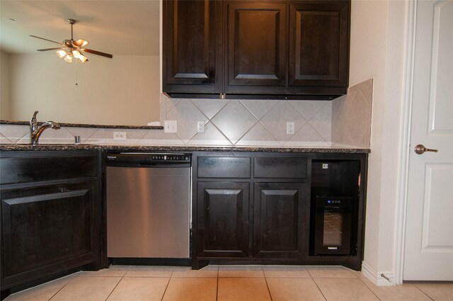 1928 Argyle Ln, Lewisville, TX 75067 - kitchen featuring stainless steel dishwasher, a ceiling fan, light tile patterned floors, a sink, and backsplash