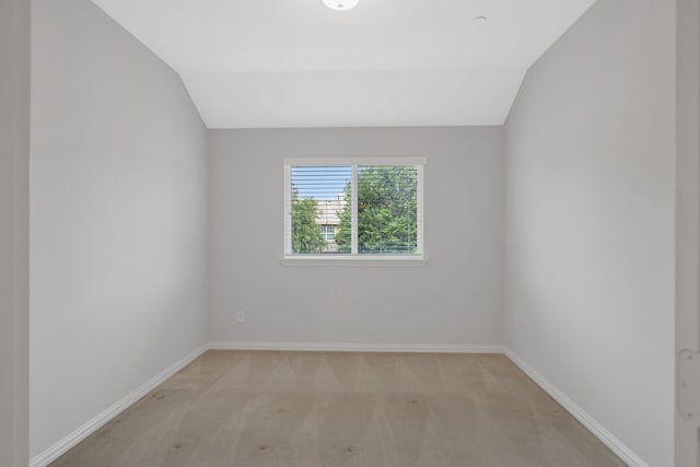 1928 Argyle Ln, Lewisville, TX 75067 - unfurnished room with vaulted ceiling, light carpet, and baseboards