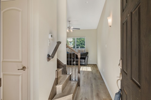 1928 Argyle Ln, Lewisville, TX 75067 - entryway with light wood-style floors, baseboards, lofted ceiling, stairs, and ceiling fan