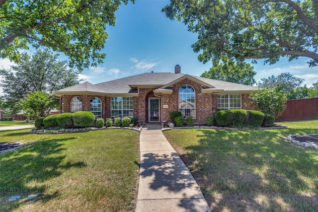 501 Tealwood Dr, Murphy, TX 75094 - view of front facade featuring brick siding and a chimney