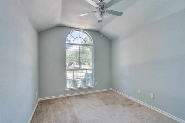 501 Tealwood Dr, Murphy, TX 75094 - spare room with carpet, lofted ceiling, baseboards, and ceiling fan
