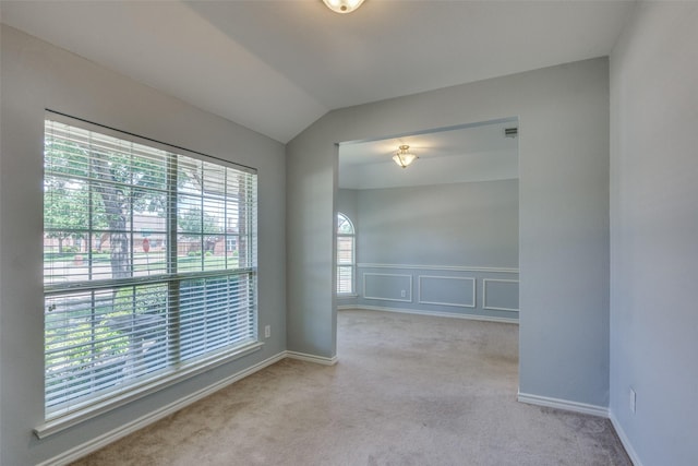 501 Tealwood Dr, Murphy, TX 75094 - carpeted spare room featuring lofted ceiling