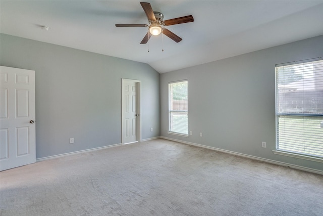 501 Tealwood Dr, Murphy, TX 75094 - carpeted spare room with healthy amount of natural light, baseboards, a ceiling fan, and lofted ceiling