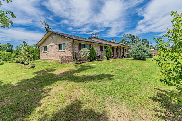 400 Rs County Road 3130, Emory, TX 75440 - back of property featuring brick siding, a chimney, and a yard
