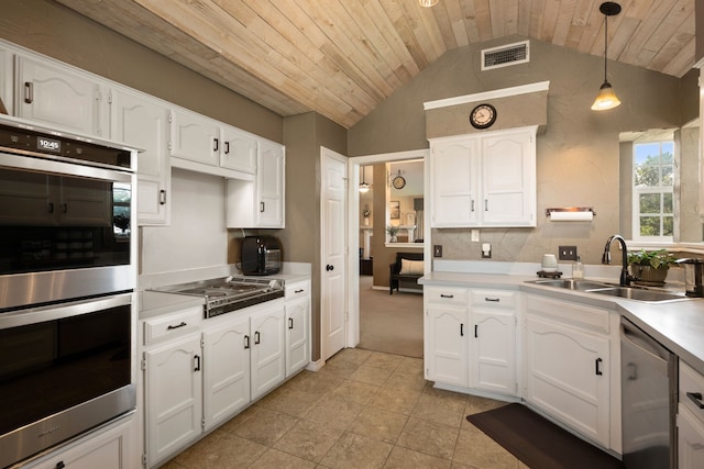 7600 Teresa Ct, North Richland Hills, TX 76182 - kitchen with appliances with stainless steel finishes, a sink, wood ceiling, lofted ceiling, and white cabinets