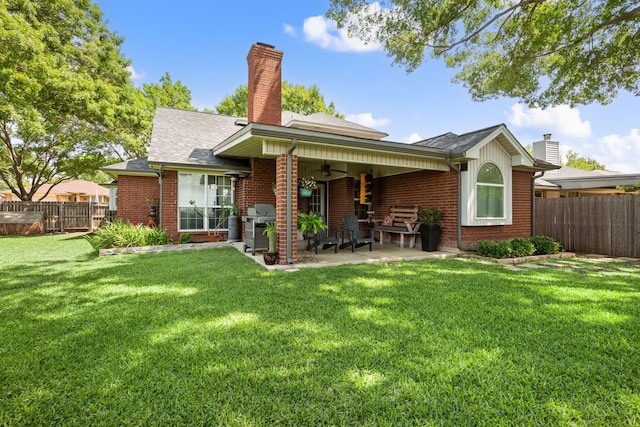 7600 Teresa Ct, North Richland Hills, TX 76182 - rear view of house featuring a chimney, a ceiling fan, brick siding, a patio area, and a shingled roof