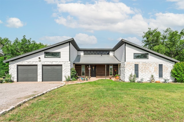 511 Mcfarland Ranch Rd, Aledo, TX 76008 - view of front of home with stone siding, gravel driveway, a front yard, a porch, and metal roof