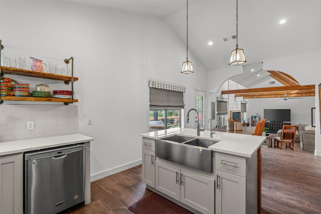 511 Mcfarland Ranch Rd, Aledo, TX 76008 - kitchen with stainless steel dishwasher, a sink, open floor plan, light countertops, and decorative backsplash