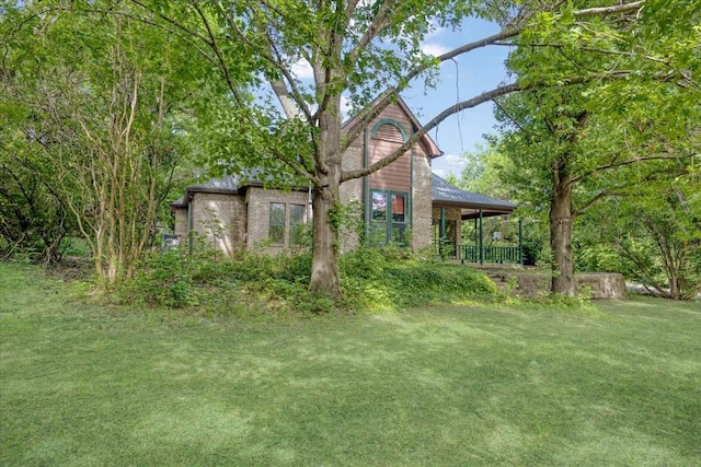 4291 County Road 862, Mckinney, TX 75071 - back of house featuring a yard and covered porch