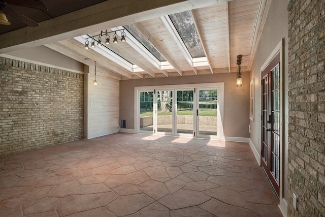4291 County Road 862, Mckinney, TX 75071 - unfurnished sunroom with a skylight, french doors, and track lighting