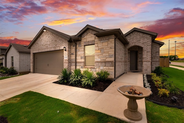 9700 Serviceberry Ln, Fort Worth, TX 76036 - french country inspired facade with stone siding, an attached garage, concrete driveway, and a front yard