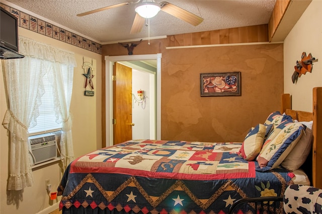 801 Prachyl Rd, Weatherford, TX 76087 - bedroom with a textured ceiling, ceiling fan, and cooling unit
