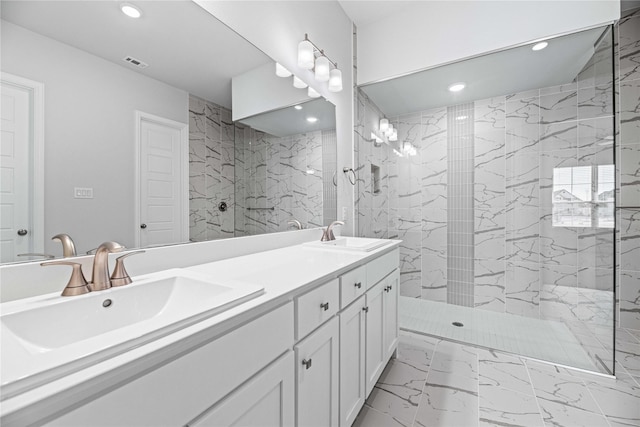 16532 Dunkirk Ln, Frisco, TX 75035 - full bath with recessed lighting, double vanity, a marble finish shower, and marble finish floors
