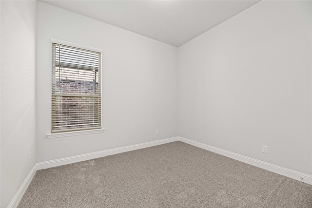 16532 Dunkirk Ln, Frisco, TX 75035 - carpeted empty room with baseboards and vaulted ceiling