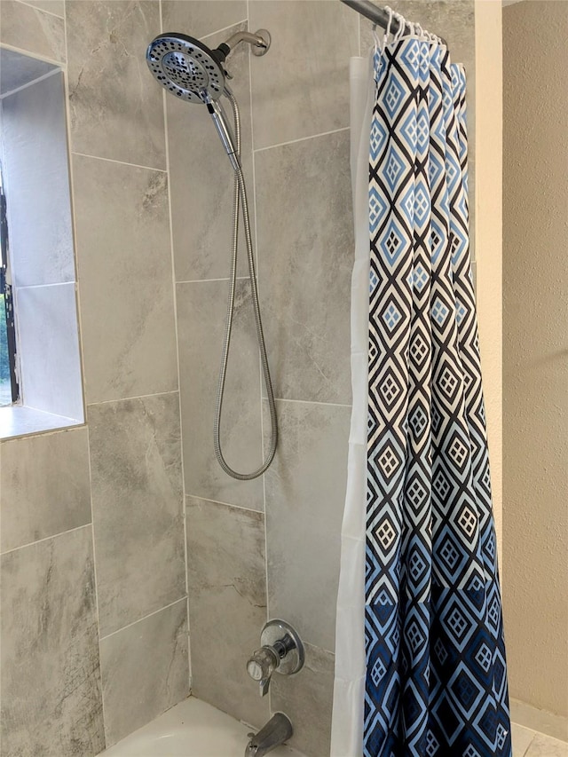 7525 Holly Hill Dr Unit 68, Dallas, TX 75231 - bathroom with shower / tub combo