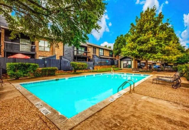 7525 Holly Hill Dr Unit 68, Dallas, TX 75231 - community pool featuring a patio area