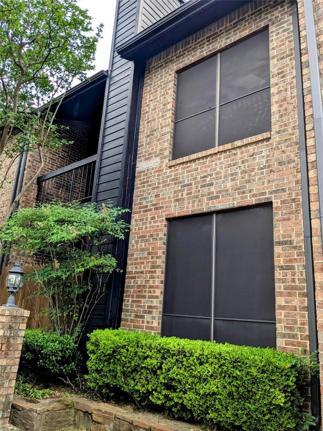 7525 Holly Hill Dr Unit 68, Dallas, TX 75231 - view of property exterior with brick siding