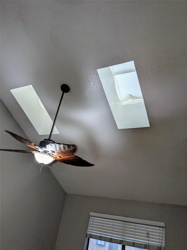 7525 Holly Hill Dr Unit 68, Dallas, TX 75231 - detailed view of a skylight and ceiling fan