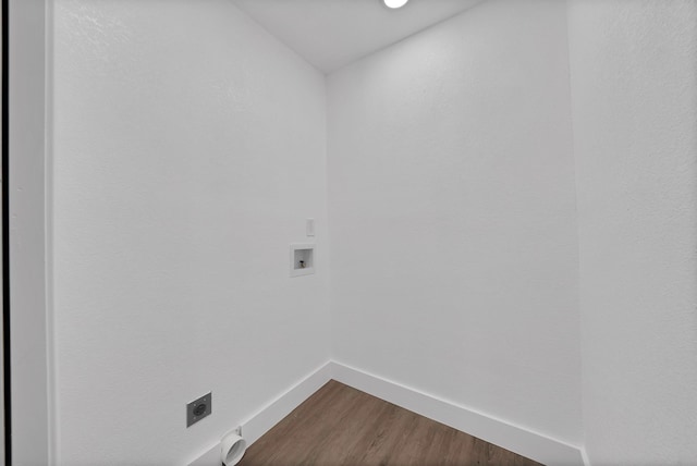6928 Glen Hills Rd, Richland Hills, TX 76118 - laundry area featuring electric dryer hookup, dark wood-type flooring, washer hookup, and baseboards