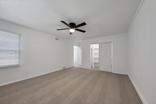 6928 Glen Hills Rd, Richland Hills, TX 76118 - unfurnished bedroom featuring light colored carpet, a ceiling fan, baseboards, and a closet