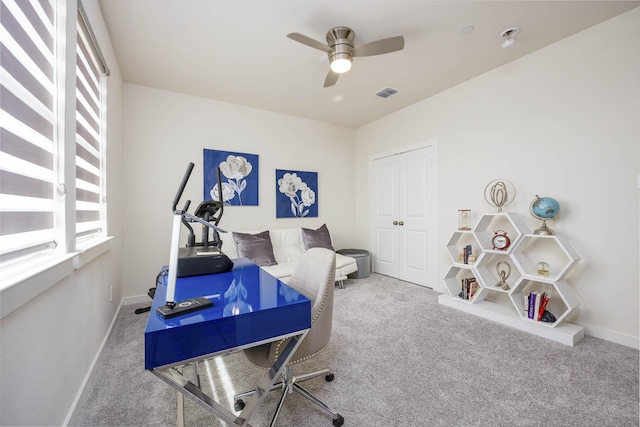 2734 Levee Ln, Lewisville, TX 75067 - home office with carpet floors, ceiling fan, and plenty of natural light