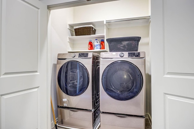 2734 Levee Ln, Lewisville, TX 75067 - laundry room featuring independent washer and dryer