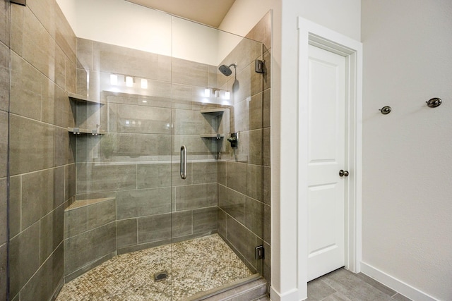 2734 Levee Ln, Lewisville, TX 75067 - full bathroom featuring a stall shower and baseboards