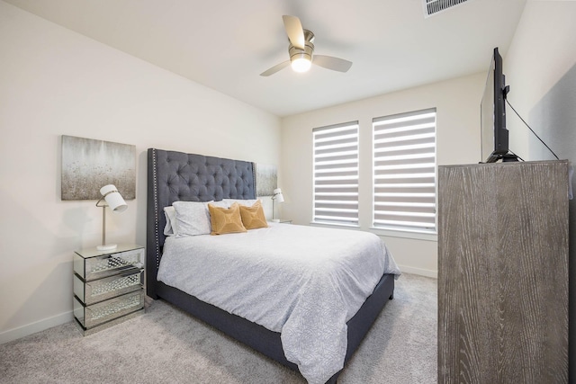 2734 Levee Ln, Lewisville, TX 75067 - carpeted bedroom with baseboards and a ceiling fan