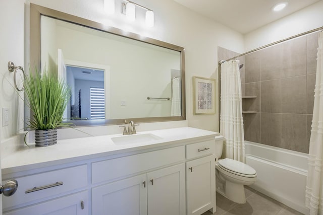 2734 Levee Ln, Lewisville, TX 75067 - bathroom featuring toilet, vanity, shower / bath combo with shower curtain, and tile patterned floors