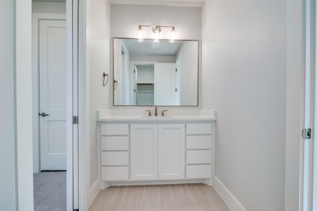 9900 Aiken Ct, Mesquite, TX 75126 - bathroom featuring baseboards and vanity