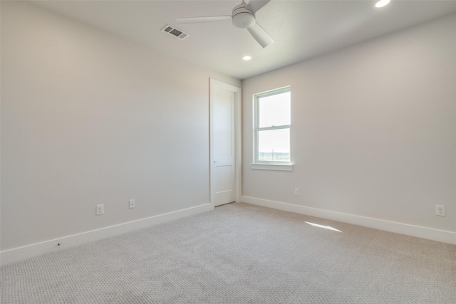 9900 Aiken Ct, Mesquite, TX 75126 - spare room with ceiling fan, light colored carpet, baseboards, and recessed lighting