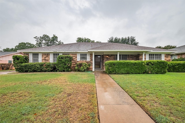 4313 Barcelona Dr, Fort Worth, TX 76133 - single story home featuring a front lawn and brick siding
