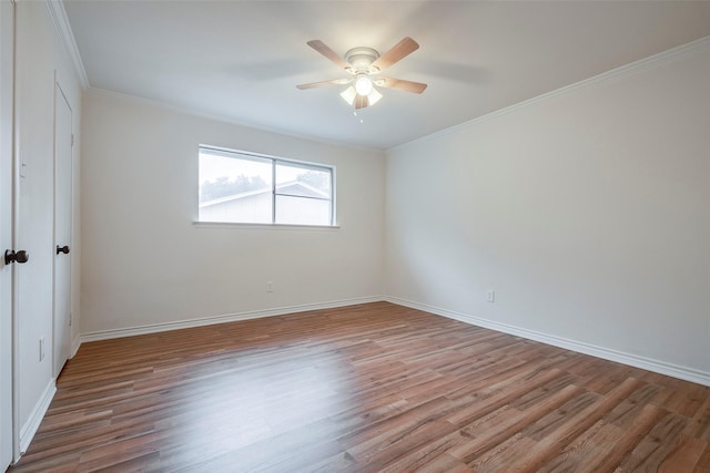 4313 Barcelona Dr, Fort Worth, TX 76133 - empty room featuring ceiling fan, wood finished floors, crown molding, and baseboards