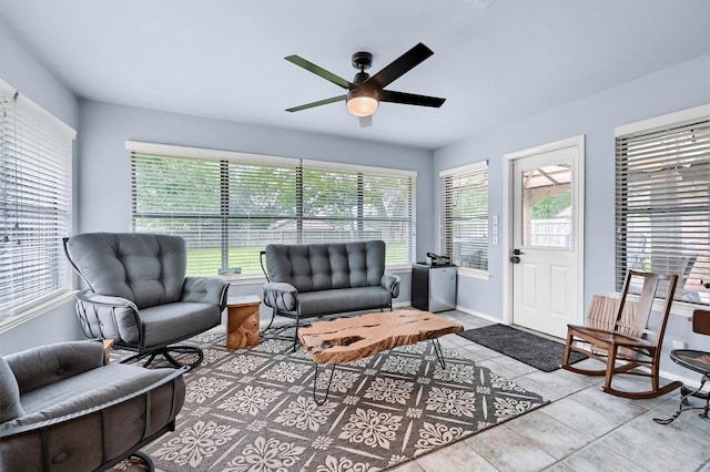116 Modoc Trl, Lake Kiowa, TX 76240 - tiled living area with healthy amount of natural light, a ceiling fan, and baseboards