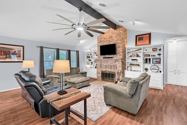 116 Modoc Trl, Lake Kiowa, TX 76240 - living area with ceiling fan, wood finished floors, and a brick fireplace