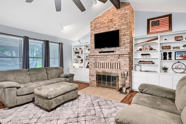 116 Modoc Trl, Lake Kiowa, TX 76240 - living room featuring ceiling fan, wood finished floors, and a fireplace