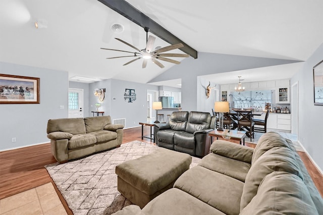 116 Modoc Trl, Lake Kiowa, TX 76240 - living room with a chandelier, ceiling fan, baseboards, and light tile patterned floors
