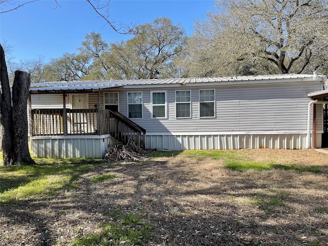 120 County Road 1719, Clifton, TX 76634 - back of house featuring metal roof