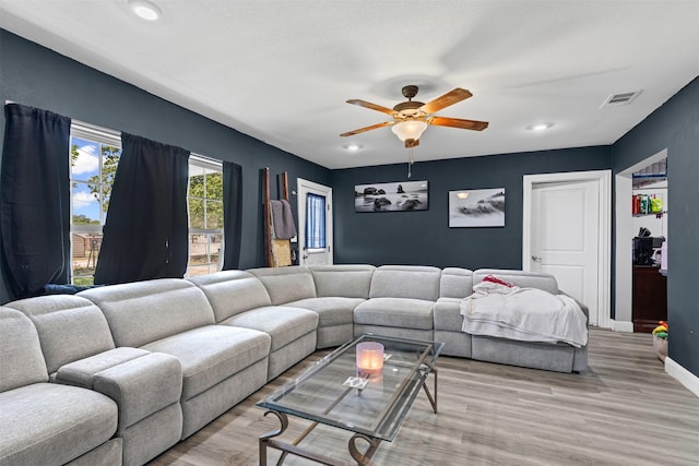 105 S Lavaca St, Whitney, TX 76692 - living area with light wood-style flooring, ceiling fan, recessed lighting, and baseboards
