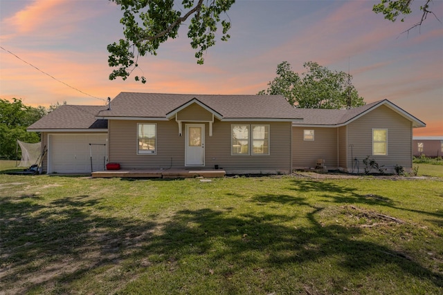105 S Lavaca St, Whitney, TX 76692 - ranch-style house featuring a garage and a lawn