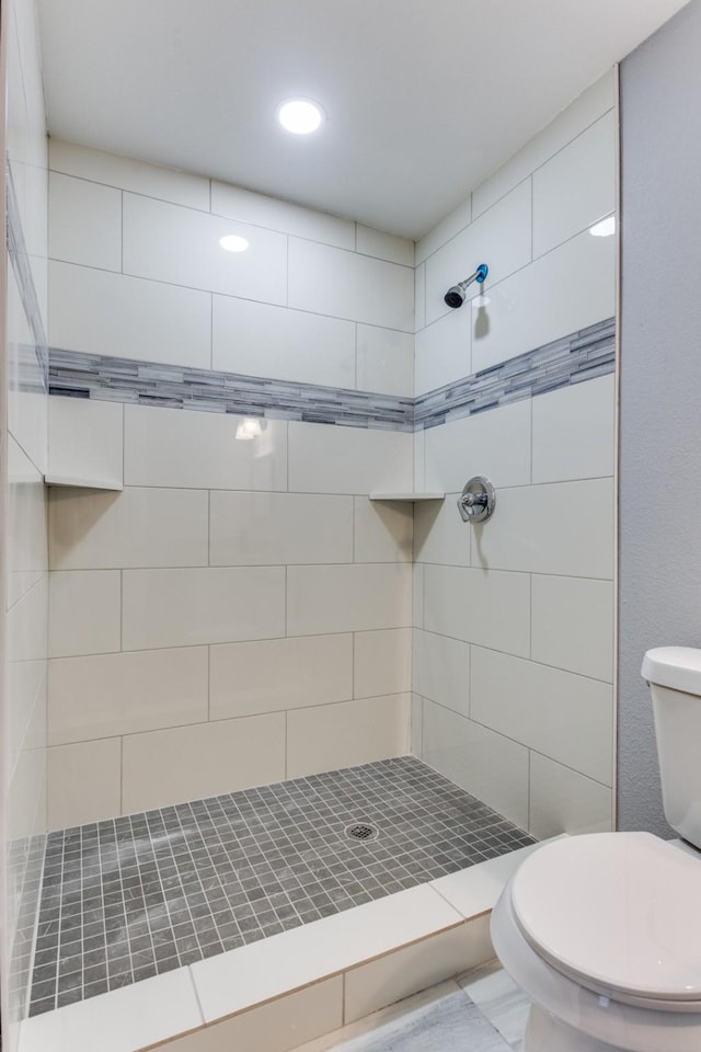 616 Hiland St, Garland, TX 75040 - full bathroom featuring toilet, a stall shower, and recessed lighting