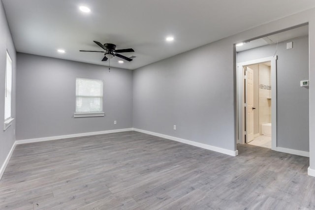 616 Hiland St, Garland, TX 75040 - empty room featuring a ceiling fan, recessed lighting, attic access, wood finished floors, and baseboards