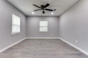 616 Hiland St, Garland, TX 75040 - empty room featuring ceiling fan, wood finished floors, baseboards, and recessed lighting