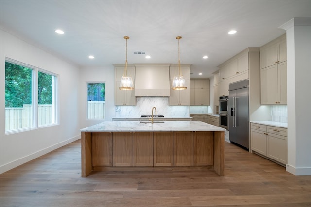 9621 Larchcrest Dr, Dallas, TX 75238 - kitchen with appliances with stainless steel finishes, custom range hood, decorative backsplash, light wood-type flooring, and recessed lighting