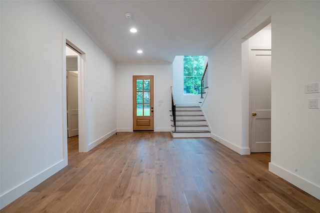 9621 Larchcrest Dr, Dallas, TX 75238 - entrance foyer featuring stairs, light wood-style floors, baseboards, ornamental molding, and recessed lighting