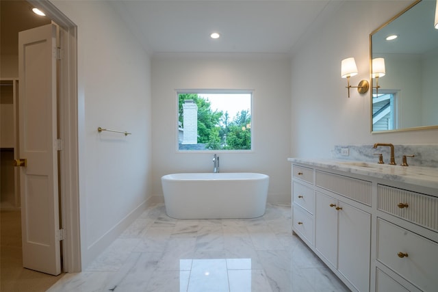 9621 Larchcrest Dr, Dallas, TX 75238 - bathroom with vanity, a freestanding tub, recessed lighting, a walk in closet, and baseboards