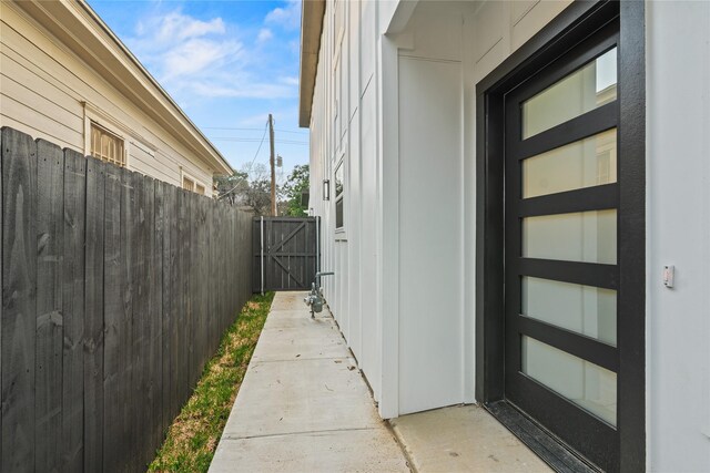 1312 Coleman Ave, Dallas, TX 75215 - view of side of home featuring a gate