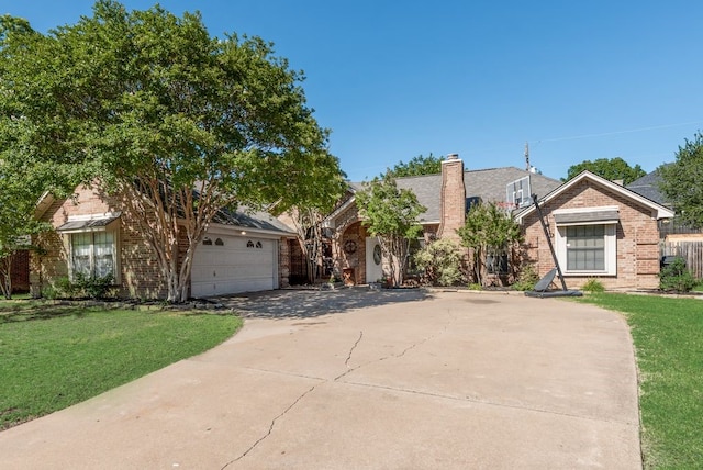 7020 Live Oak Dr, North Richland Hills, TX 76182 - obstructed view of property with brick siding, concrete driveway, a front yard, and a chimney